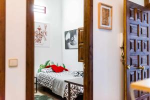 Posteľ alebo postele v izbe v ubytovaní Cómodo y moderno apartamento centro Granada