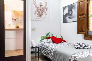 Posteľ alebo postele v izbe v ubytovaní Cómodo y moderno apartamento centro Granada