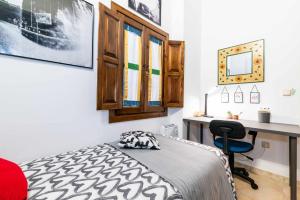 Posteľ alebo postele v izbe v ubytovaní Cómodo y moderno apartamento centro Granada