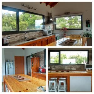 a kitchen with wooden counter tops and windows at La Casa del Viento in San Martín de los Andes +28 photos