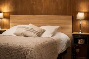 Postel nebo postele na pokoji v ubytování La Chambre Enchantée