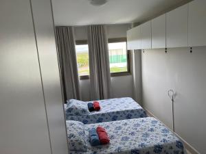 Postel nebo postele na pokoji v ubytování Praia do Forte - Apartamento no Iberostar belíssimo + 35 fotografií