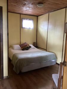 Llit o llits en una habitació de Cabaña la Solar. 25 fotos més