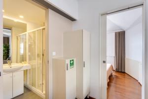 Koupelna v ubytování Traça Apartments by DA'HOME