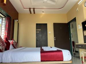 Postel nebo postele na pokoji v ubytování S2 Residency