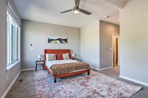a bedroom with a bed and a ceiling fan at Commerce City Townhome about 6 Mi to Dtwn Denver! in Thornton