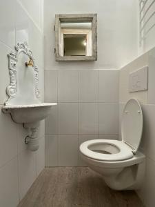 Ένα μπάνιο στο Багатомісні Апартаменти на Арсенальній