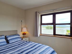 Postel nebo postele na pokoji v ubytování Inishnee Haven