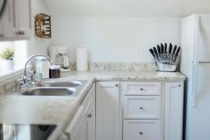 Η κουζίνα ή μικρή κουζίνα στο Charming Apt with chic decor Superhost w 5 Stars