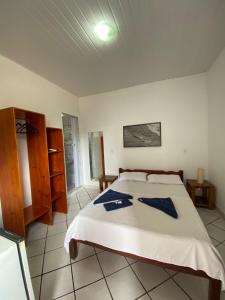 Cama ou camas em um quarto em Pousada Pedra Furada