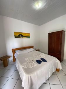 Cama ou camas em um quarto em Pousada Pedra Furada