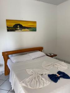 Cama ou camas em um quarto em Pousada Pedra Furada