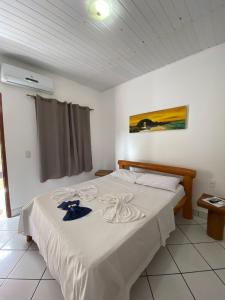 Cama ou camas em um quarto em Pousada Pedra Furada
