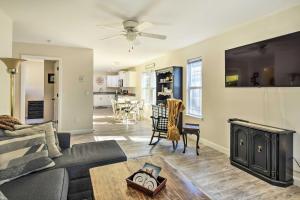 a living room with a couch and a fireplace at Family-Friendly Greer Home with Balcony and Yard! in Greer