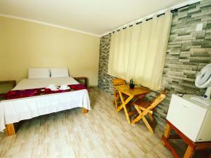 Postel nebo postele na pokoji v ubytování RDS Hospedagem
