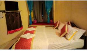 Łóżko lub łóżka w pokoju w obiekcie Hotel Desert