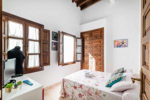 Posteľ alebo postele v izbe v ubytovaní Cómodo y moderno apartamento centro Granada