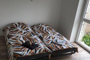 Ένα ή περισσότερα κρεβάτια σε δωμάτιο στο LA MAISON POURRIE