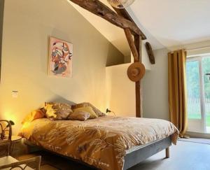 A bed or beds in a room at O20 Esprit Nature