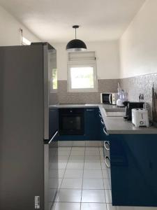 T3 de Standing aux trois ilets / Vue Mer tesisinde mutfak veya mini mutfak