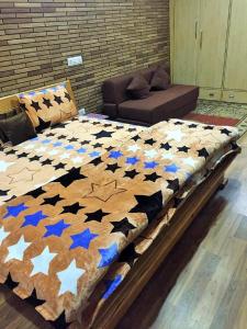 Krevet ili kreveti u jedinici u okviru objekta Anuppam Home Stay