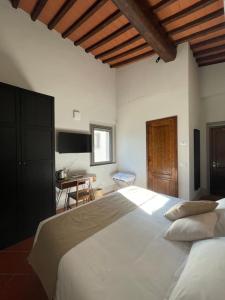 Postel nebo postele na pokoji v ubytování Casale La Gora - B&B di charme