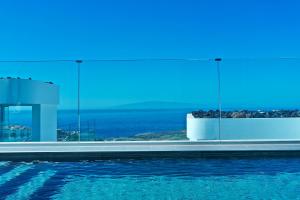 a swimming pool with a view of the ocean at Villa Deluxe 1&2 - Casangular by Upper in Adeje