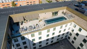 an overhead view of a building with a swimming pool at Clarion Hotel Sundsvall in Sundsvall