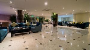 Χώρος καθιστικού στο Wakra Inn Hotel Apartments
