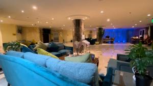 Χώρος καθιστικού στο Wakra Inn Hotel Apartments