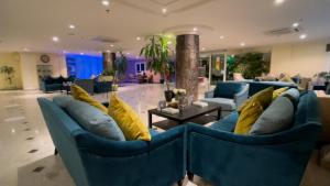 Χώρος καθιστικού στο Wakra Inn Hotel Apartments