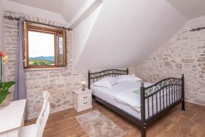 Posteľ alebo postele v izbe v ubytovaní Holiday Villa Mirce - Lovište + 37 fotografií