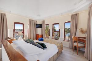 Postel nebo postele na pokoji v ubytování Hotel Ciutat Jardi