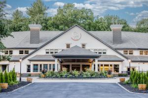 a rendering of the front of the inn at Chateau Merrimack Hotel & Spa in Tyngsboro