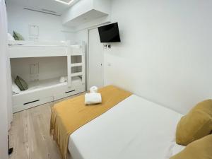 Ένα ή περισσότερα κρεβάτια σε δωμάτιο στο Hostel Charino
