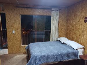 GLL HOTEL客房内的一张或多张床位