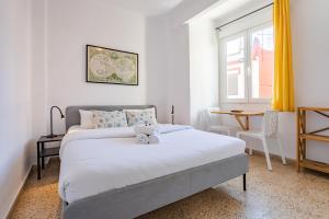 Postel nebo postele na pokoji v ubytování Hostal El Perelló, Valencia