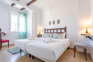 Postel nebo postele na pokoji v ubytování Hostal El Perelló, Valencia