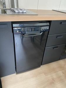 Una cocina o cocineta en Le Côté Cour
