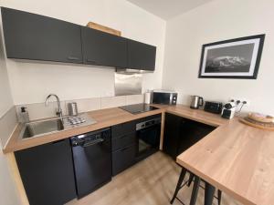 Una cocina o cocineta en Le Côté Cour
