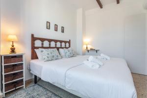 Postel nebo postele na pokoji v ubytování Hostal El Perelló, Valencia