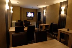 TV a/nebo společenská místnost v ubytování Hotel Zum Weißen Roß