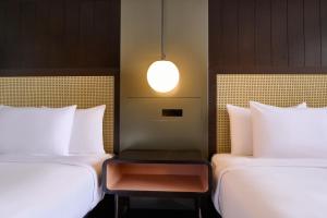 Postel nebo postele na pokoji v ubytování Hotel Renew