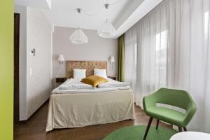 Postel nebo postele na pokoji v ubytování Best Western Hotel Akersberga