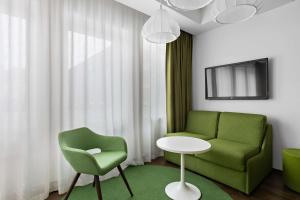 TV a/nebo společenská místnost v ubytování Best Western Hotel Akersberga
