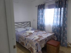 Postel nebo postele na pokoji v ubytování CortLang Vacation Rentals, El Pueblito