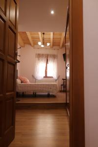 Postel nebo postele na pokoji v ubytování los arcos y ancasela