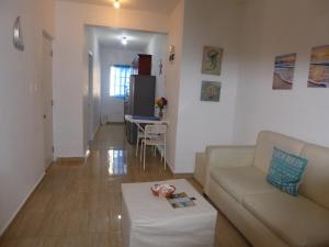 Posezení v ubytování CortLang Vacation Rentals, El Pueblito