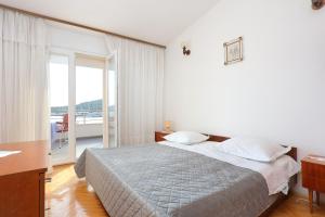 Lova arba lovos apgyvendinimo įstaigoje Apartments by the sea Rogoznica - 7558