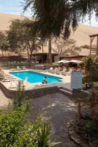 A piscina localizada em Hotel El Huacachinero ou nos arredores